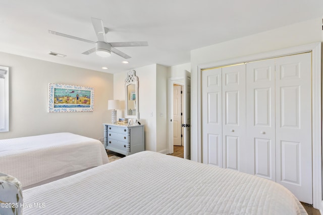 bedroom featuring ceiling fan, visible vents, a closet, and recessed lighting