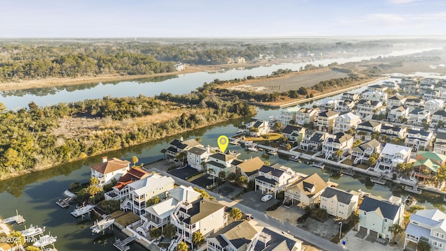 aerial view with a water view and a residential view