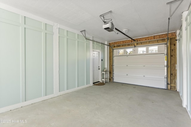 garage featuring a garage door opener