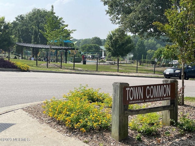 view of street with sidewalks and curbs