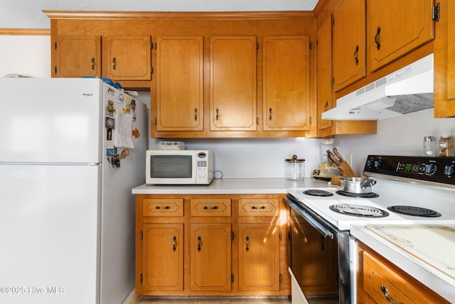 kitchen with brown cabinetry, white appliances, light countertops, and under cabinet range hood