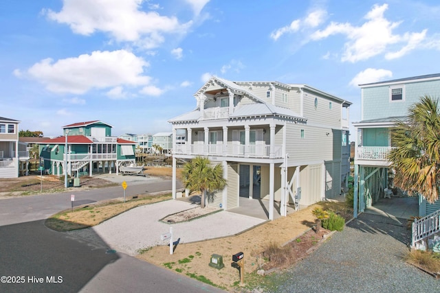 beach home with a carport and driveway