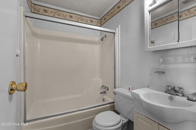 bathroom featuring toilet, shower / washtub combination, and vanity