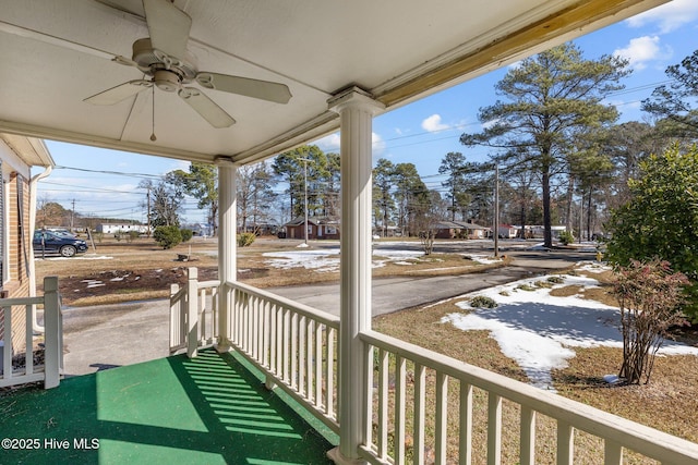 exterior space featuring ceiling fan and covered porch