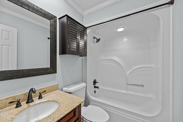 bathroom with toilet, ornamental molding, shower / washtub combination, and vanity