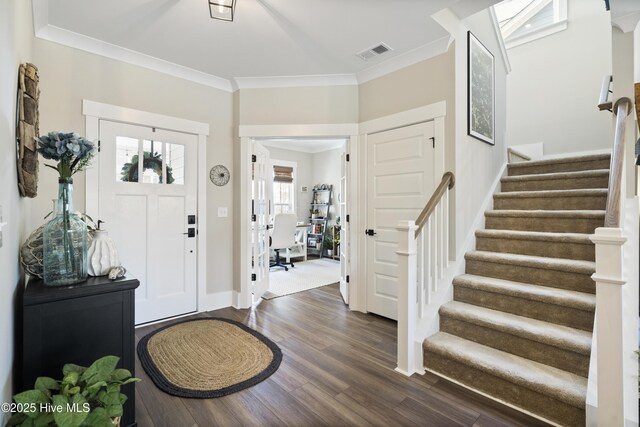 living room with visible vents and light colored carpet