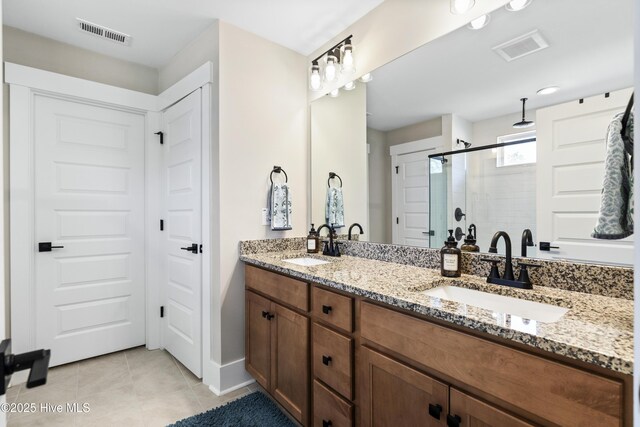 spacious closet with light carpet and visible vents