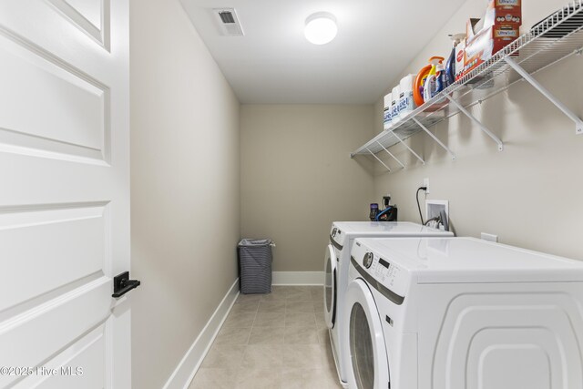 full bath featuring a shower with shower curtain, recessed lighting, visible vents, and tile patterned floors