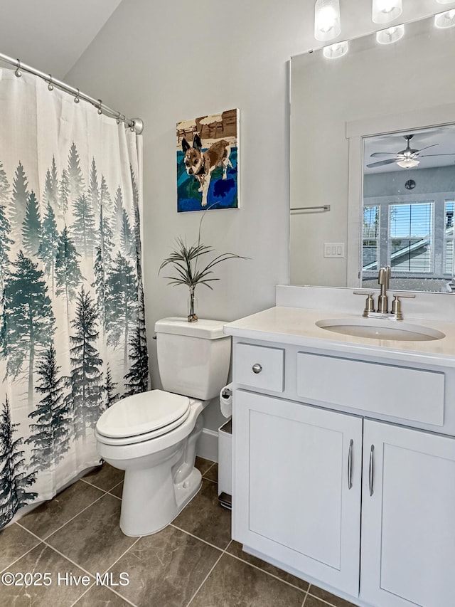 full bath featuring ceiling fan, toilet, a shower with shower curtain, vanity, and tile patterned floors