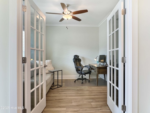 office featuring ornamental molding, french doors, wood finished floors, and baseboards