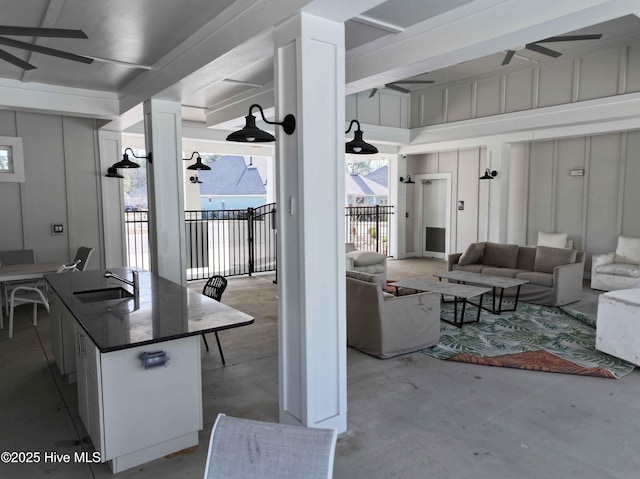 view of patio / terrace featuring a sink and an outdoor living space