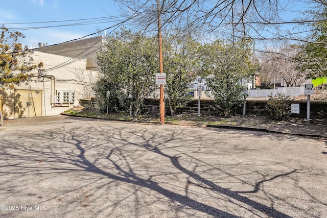 view of road featuring curbs