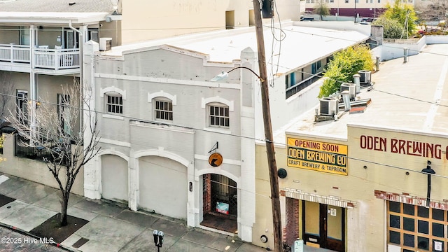 view of building exterior featuring central AC unit