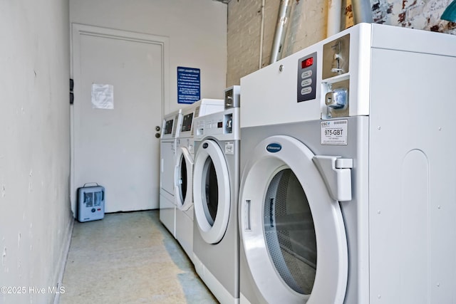 common laundry area with washing machine and clothes dryer