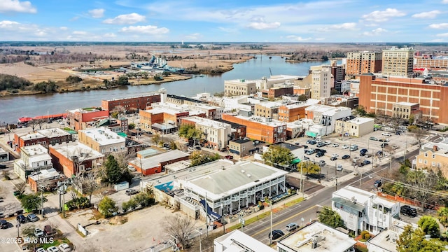 drone / aerial view with a water view and a city view