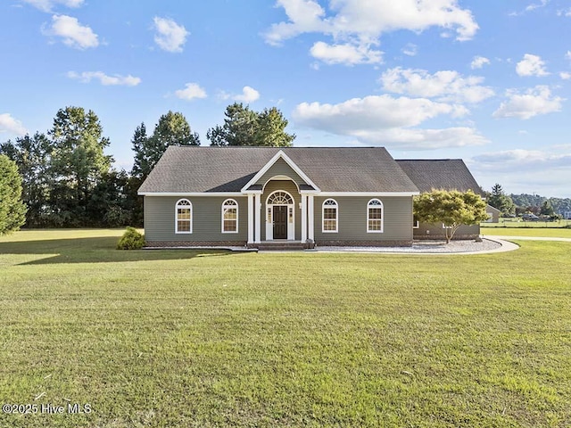 view of front of home featuring a front lawn