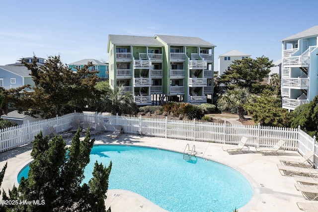 community pool with fence