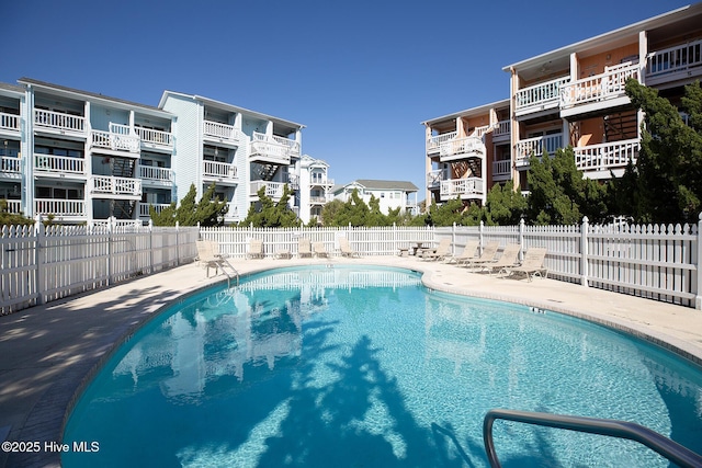 pool featuring fence