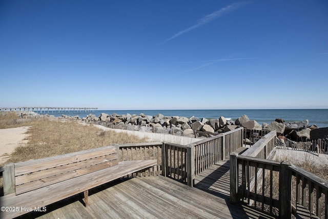 view of community featuring a view of the beach and a water view