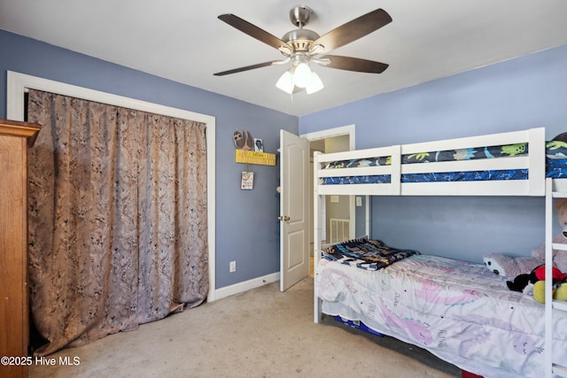 bedroom with light carpet, baseboards, visible vents, and a ceiling fan