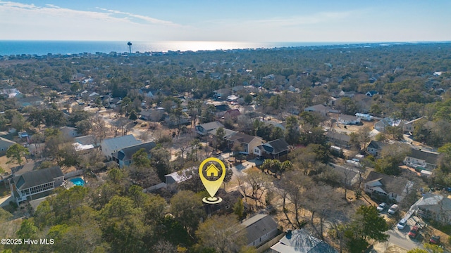 bird's eye view featuring a residential view and a water view