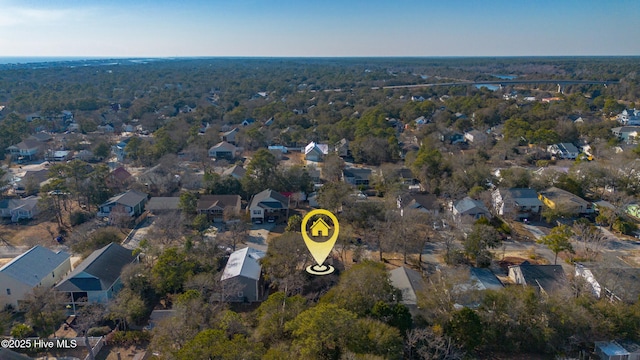 birds eye view of property with a residential view