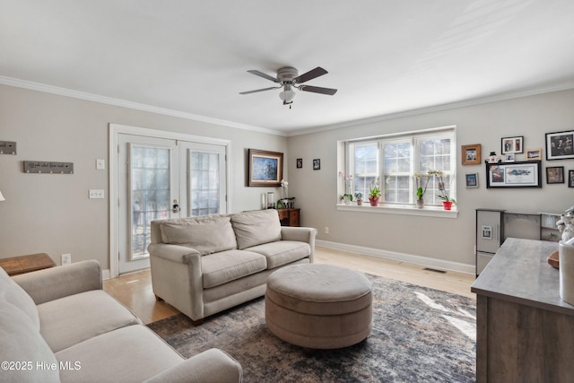 living room with ornamental molding, french doors, wood finished floors, and visible vents