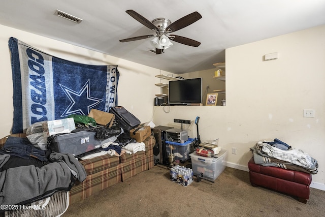 carpeted living area with a ceiling fan, visible vents, and baseboards