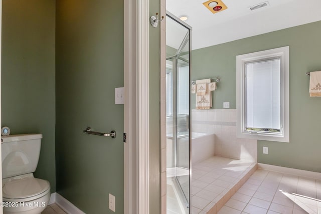 full bathroom with tile patterned flooring, toilet, visible vents, baseboards, and a stall shower