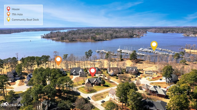 birds eye view of property featuring a water view