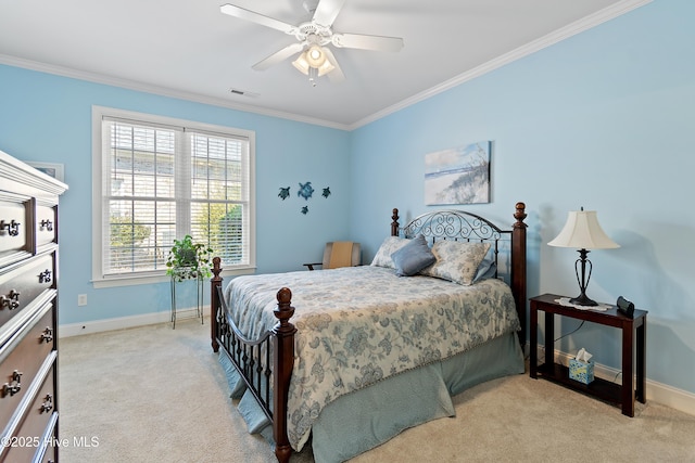 bedroom featuring light carpet, baseboards, visible vents, and crown molding