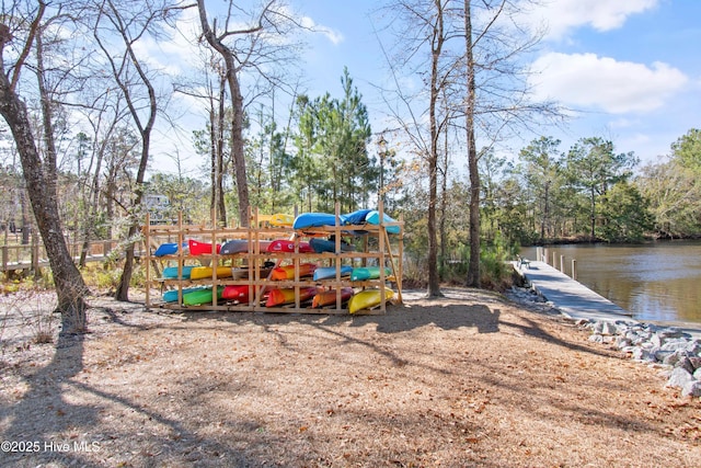 community playground with a dock and a water view