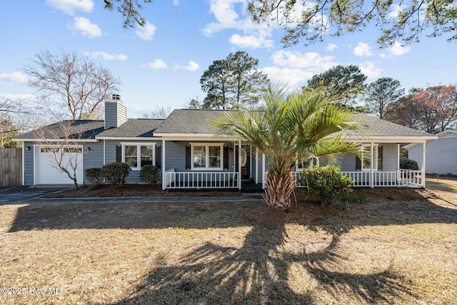 ranch-style house with covered porch, roof with shingles, a chimney, and an attached garage