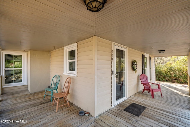 wooden deck featuring a porch