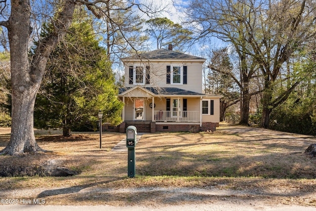 view of front facade with covered porch, crawl space, roof with shingles, and a chimney