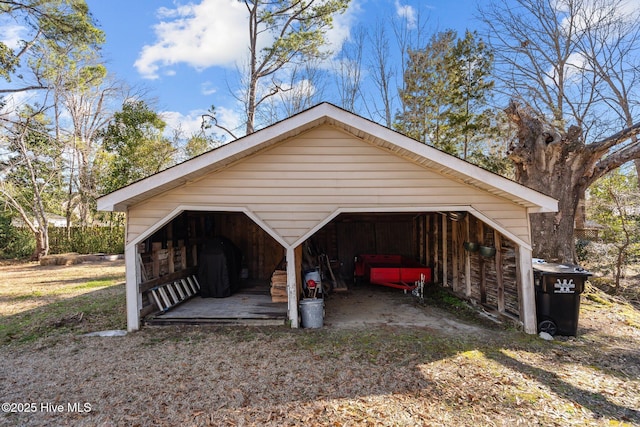 view of parking featuring a detached garage
