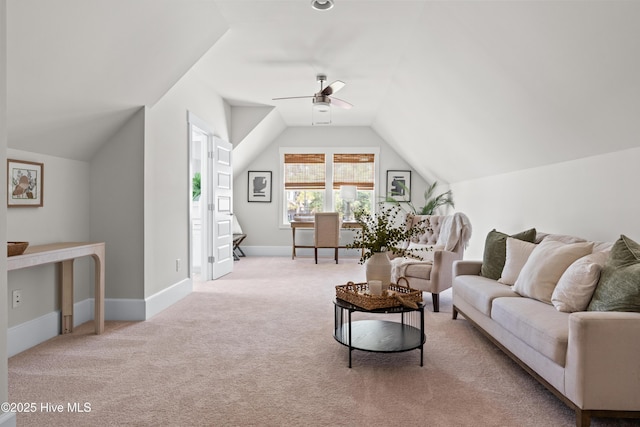 living room with light carpet, baseboards, vaulted ceiling, and a ceiling fan