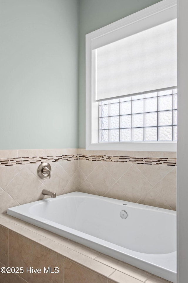 bathroom featuring a garden tub