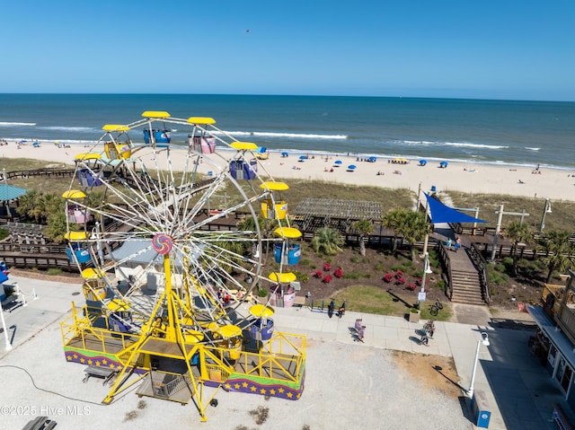 aerial view featuring a water view and a view of the beach