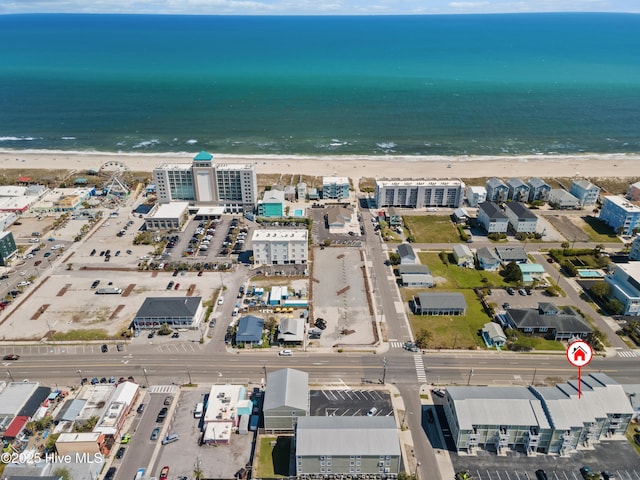 aerial view with a beach view and a water view