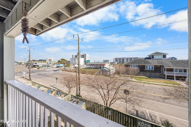 balcony featuring a city view