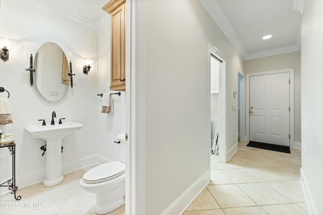 bathroom with toilet, recessed lighting, baseboards, tile patterned floors, and crown molding