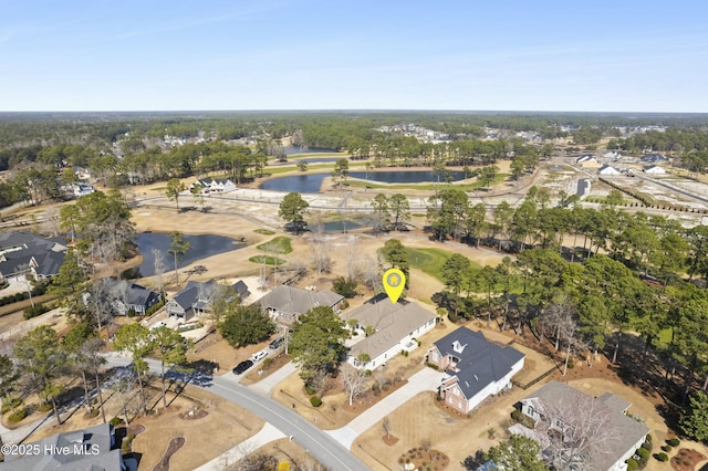 drone / aerial view featuring a water view and a residential view