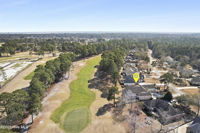 bird's eye view with view of golf course