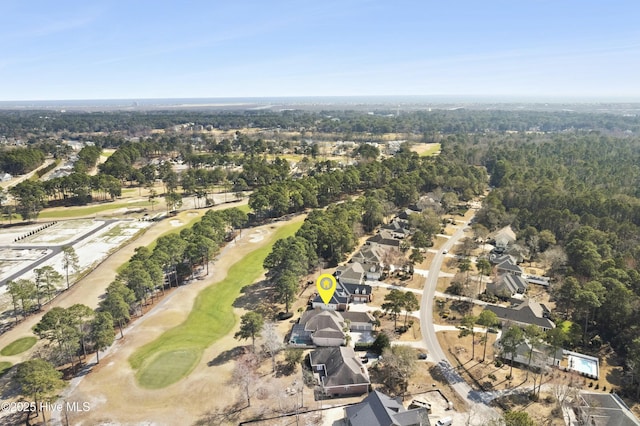 birds eye view of property with golf course view