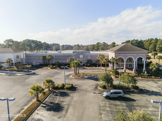 exterior space featuring uncovered parking