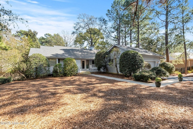 ranch-style home with a garage