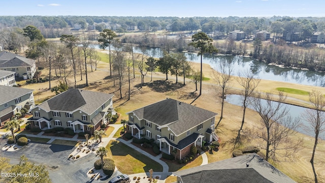 aerial view featuring a water view and a residential view