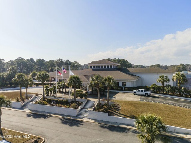 view of front of home featuring uncovered parking