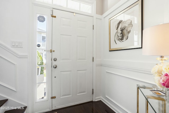 entrance foyer featuring dark wood-type flooring